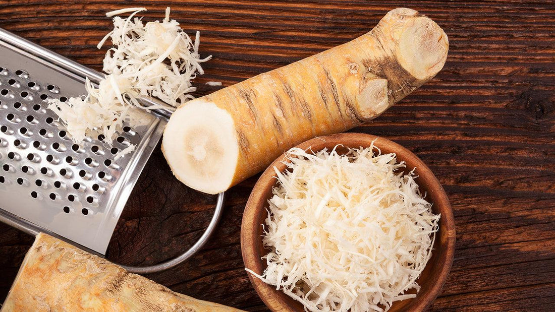 Fresh horseradish root beside grated horseradish