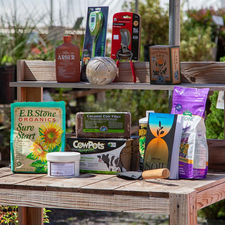 Assorted garden products arranged on wooden steps