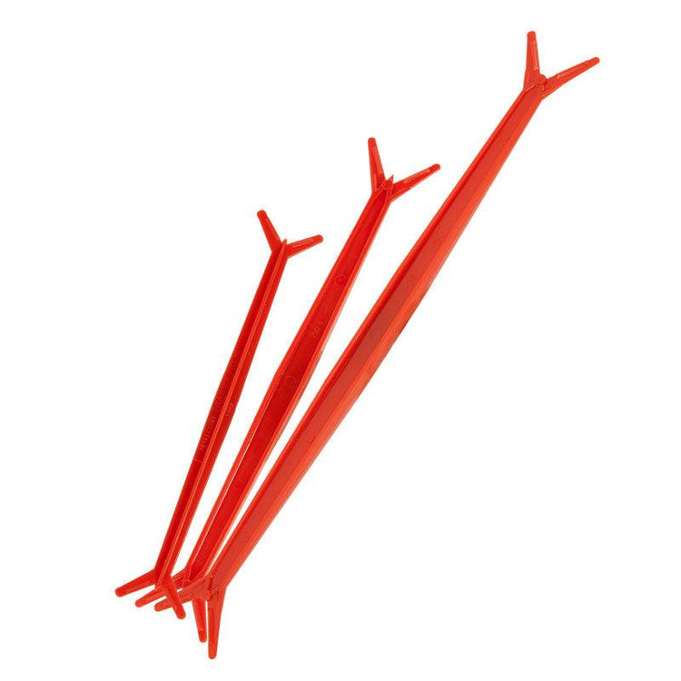Three red tree-branch limb spreaders