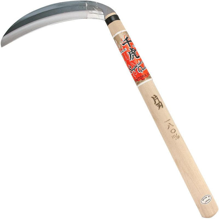 Hand sickle with a curved silver blade