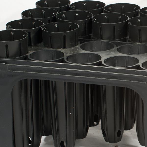 Stacked black tree and forestry pots