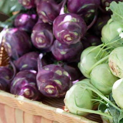 Purple and green kohlrabi in a basket