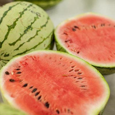 Whole and cut watermelons